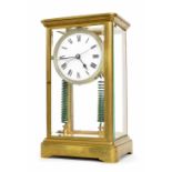 Very rare J Cauderay's patent of 1893 electric mantel clock,; the four-sided glass case supports a