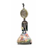 Viennese silver-gilt and enamel monstrance clock, base of bell form on silvered paw feet and