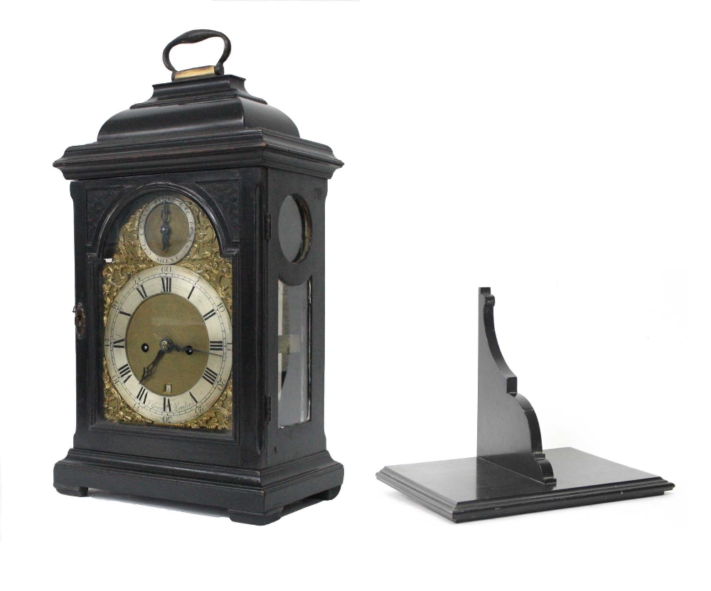 Good English ebonised double fusee bracket clock and bracket, the 7" brass arched dial signed J.