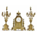 Impressive French lacquered brass two train mantel clock garniture, the movement with outside