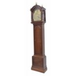 Good mahogany eight day longcase clock with five pillar movement, the 12" brass arched dial signed