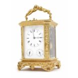 French ornate Grand Sonnerie repeater carriage clock striking on a bell, the dial inscribed Gde