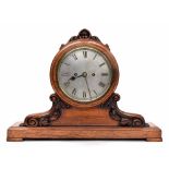 Light oak double fusee shop counter clock striking on a gong, the 7" silvered dial within a