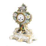 Dresden style porcelain tree shaped two train mantel clock, the Henri Marc movement with outside