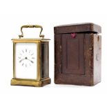 French carriage clock striking on a bell, within a corniche brass case, 7" high, with Morocco