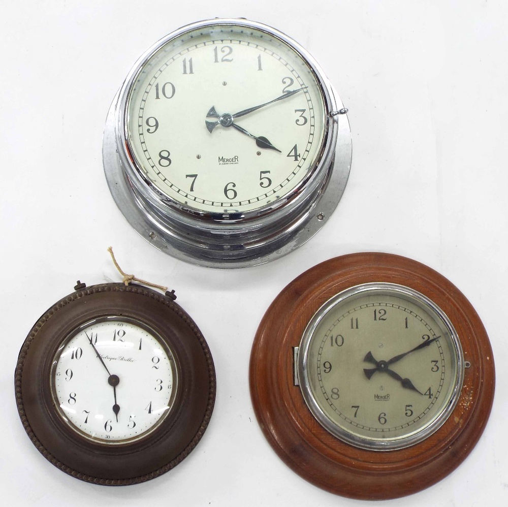 Mercer electric wall slave clock, with 6" silvered dial in 10" diameter wooden case; also Mercer "