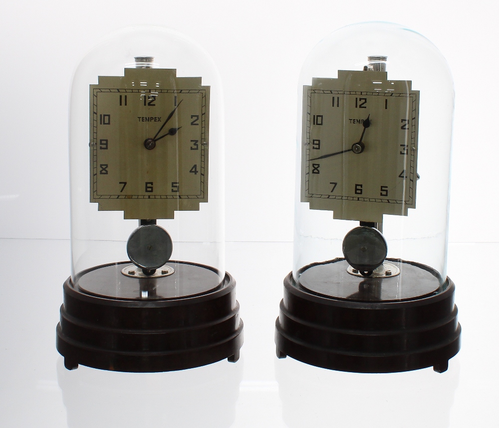 Two Tempex Art Deco electric clocks on Bakelite bases, under domes, with chrome posts and pendulums, - Image 2 of 2