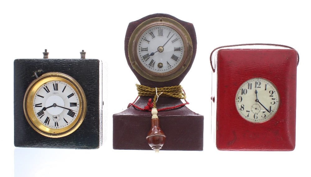 Early 20th century Ever Ready bedside clock in original red leather case, the eight day mechanical