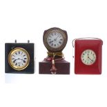 Early 20th century Ever Ready bedside clock in original red leather case, the eight day mechanical