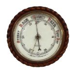 Circular wall aneroid barometer, the 10" white dial signed F.S. Reich, Folkestone, within a rope