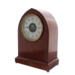 Bulle electric clock with original Bulle battery in an arched top wooden case with beading, 5"