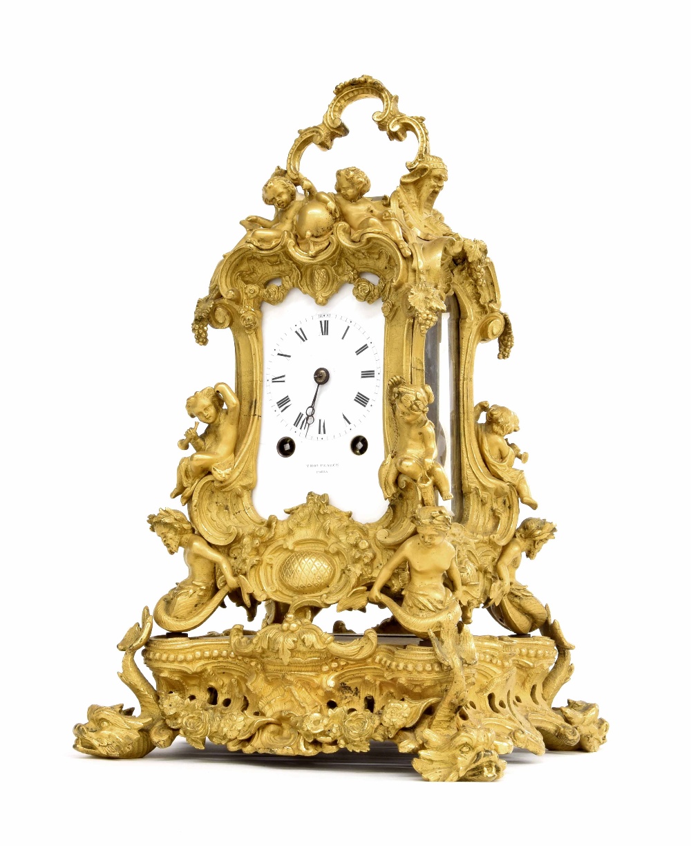 Ormolu travelling clock, circa 1840, with an enamel dial signed for Thos. Pearce Paris and similarly
