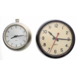 Gents synchronous wall clock in 8" silvered case with silver 6" dial; also a Gents 11" Bakelite