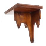 Gothic yew wood clock bracket, 10.5" wide, 7.25" deep, 11.5" high