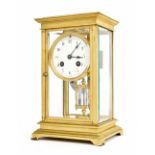 French gilded brass four glass two train mantel clock, the Japy Freres movement striking on a