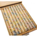 Favorite wooden drawer containing a large quantity of Favorite watch hands including nos. from