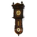 German walnut two train compendium wall clock, the 5" cream chapter ring enclosing a foliate