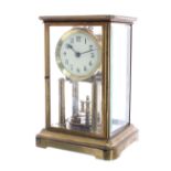 Circa 1905 Gustav Becker torsion clock, in four-sided brass and bevelled glass case, with 3.5"