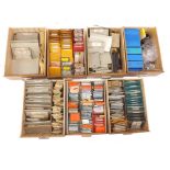 Seven wooden drawers containing a large quantity of mainsprings for alarm clocks, Oris 430