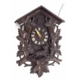 Black Forest two train cuckoo wall clock, within a chalet case, 28" high overall (pendulum and two