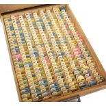 Favorite wooden drawer containing a large quantity of Favorite watch hands including nos. from 101