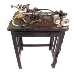 Selecta Unimat electric lathe with collets, upon an ebonised table fitted with a frieze drawer