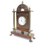 Sedan style clock with fusee verge movement, unsigned, inset into a walnut and brass pillared