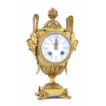 French novelty two train mantel clock in the form of a Classical urn, the 3" white dial signed