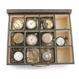 Twelve-compartment drawer containing a quantity of pocket watches for spares or repair to include