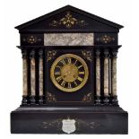Large French black and grey marble two train mantel clock striking on a gong, the 5.25" black marble