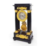 Ebonised two train portico mantel clock, the movement with outside countwheel and striking on a