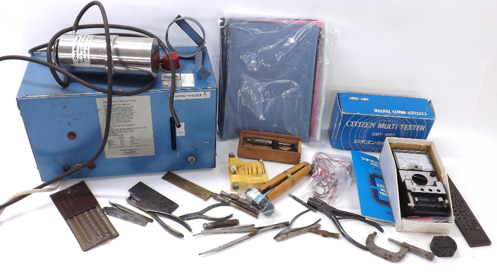 Selection of tools from a watchmaker's workshop to include a Seiko tool, Citizen Multi Tester and