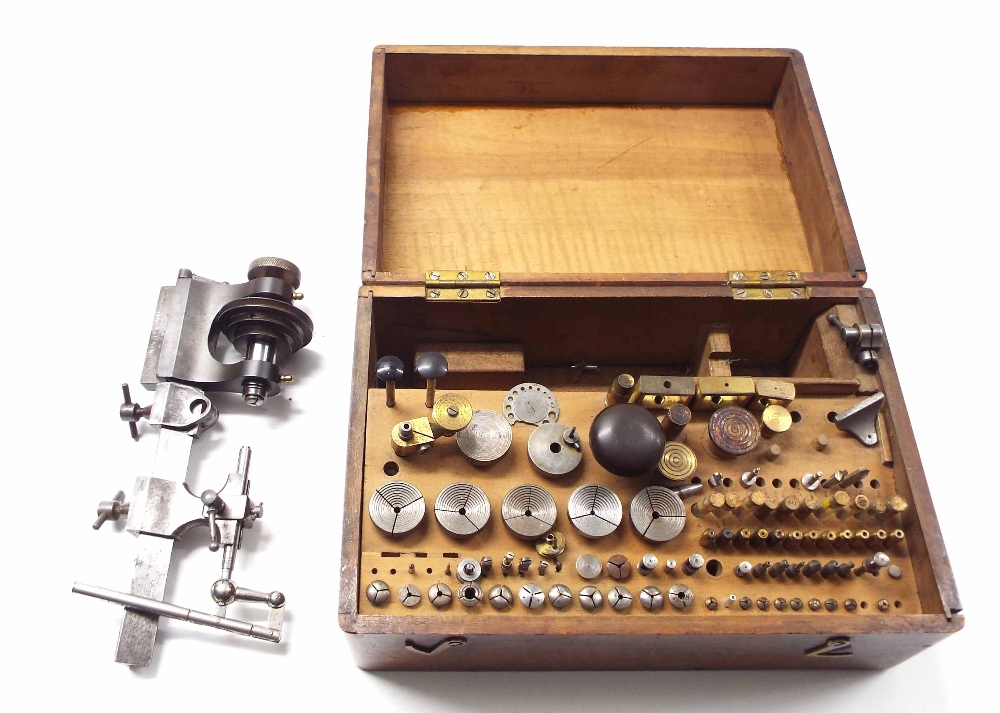 Small 6mm watchmaker's lathe, within a fitted mahogany box, 10.5" wide overall