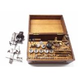 Small 6mm watchmaker's lathe, within a fitted mahogany box, 10.5" wide overall