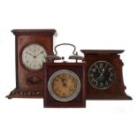Three circa 1920 alarm clocks: one in a cottage industry style case with externally mounted bells,