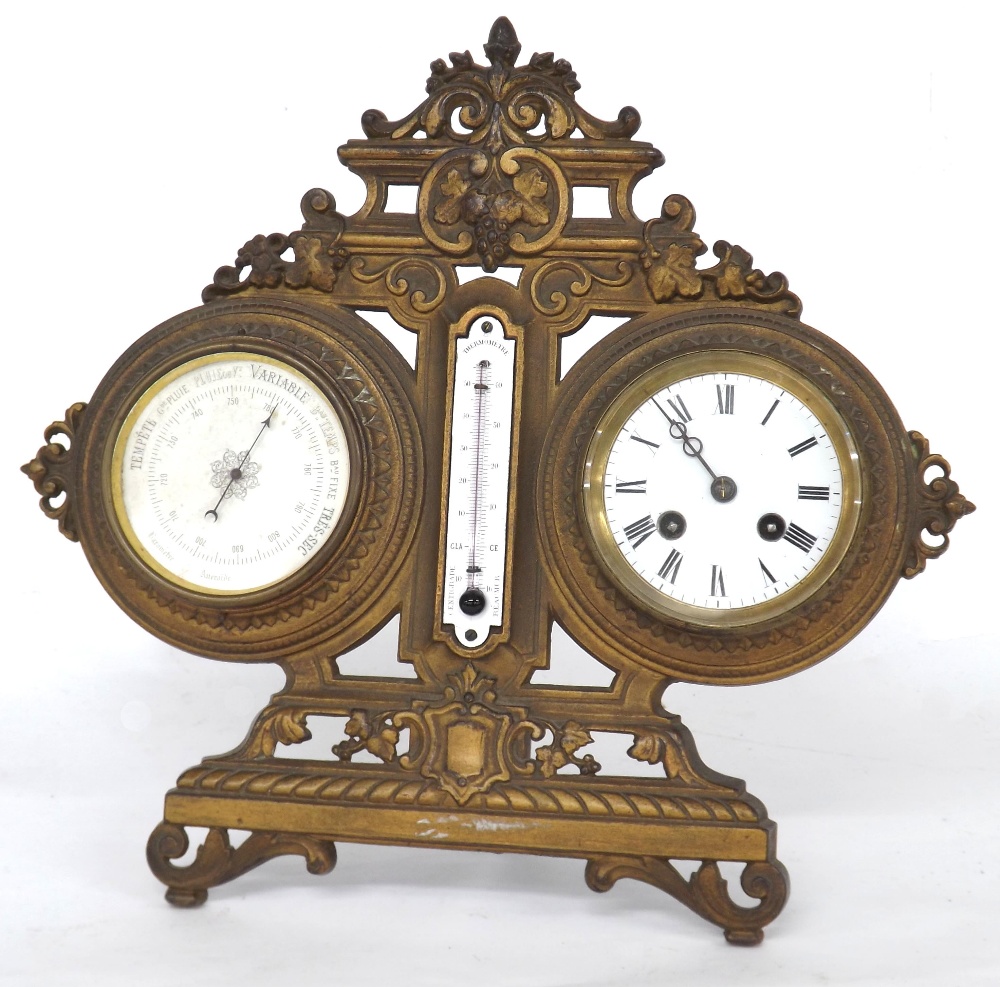 Gilt metal easel desk compendium, comprising a barometer and eight day clock with 3.75" white