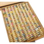 Favorite wooden drawer containing a large quantity of Favorite watch hands including nos. from 735