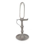 Antique pewter chamber stick candle clock, the glass reservoir over a thumb piece handle supported