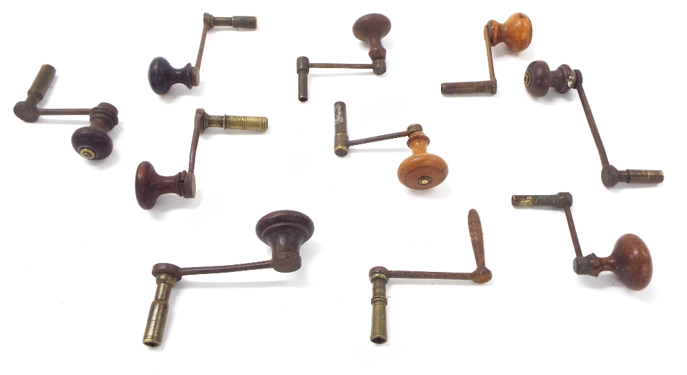 Ten various crank handle winding keys