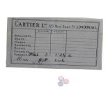 Cartier Ltd - three unmounted cabouchon opals, 5mm diameter, 1.24ct approx, in a Cartier paper