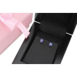 Pair of platinum tanzanite oval-cut stud earrings, 1.00ct approx, 6mm x 4mm ** As new condition,