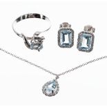 Modern 18ct white gold blue topaz and diamond jewellery suite, comprising a pendant on necklace,