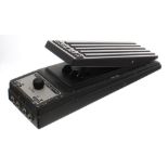 Boss FV-200 keyboard volume pedal; together with a Qwik Tune automatic guitar and bass tuner
