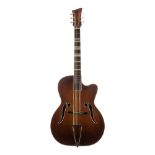 1950s Melodija archtop guitar, made in Slovenia; Finish: amber burst, lacquer checking and various