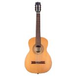 Three nylon string guitars in varying conditions including a Dotras Cordoba, a Manuel Segura and