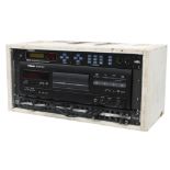 Bespoke wooden rack unit enclosing three audio racks including a Digitech TSR-12 studio reverb and