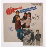 The Monkees - autographed LP signed by David Jones and Peter Tork; together with a separate