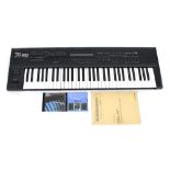 Roland JV-80 multi-timbral synthesizer, made in Japan, ser. no. BE91429, with owners manual, Rich