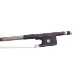 Silver mounted violin bow by and stamped K. Gliszczynski, the stick round, the ebony frog inlaid