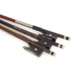 Three French nickel mounted violin bows, unstamped (3)